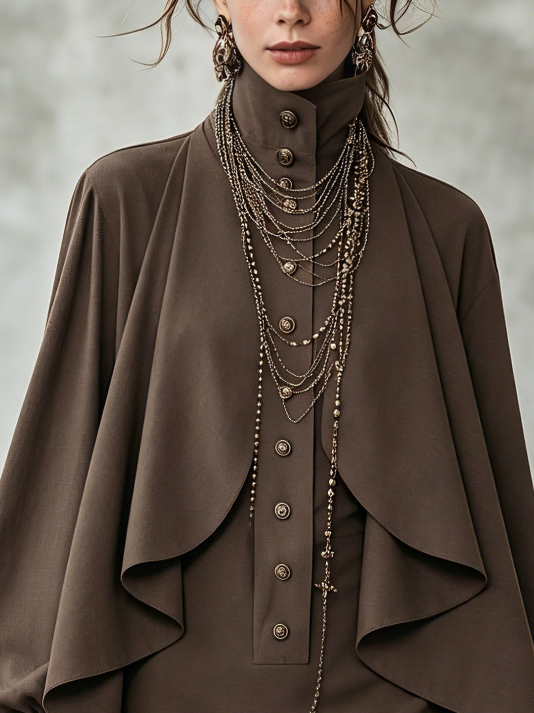 Chocolate high-neck mini dress with cape-style paneling